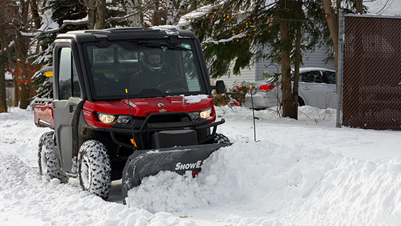 Snowplow on sidewalk